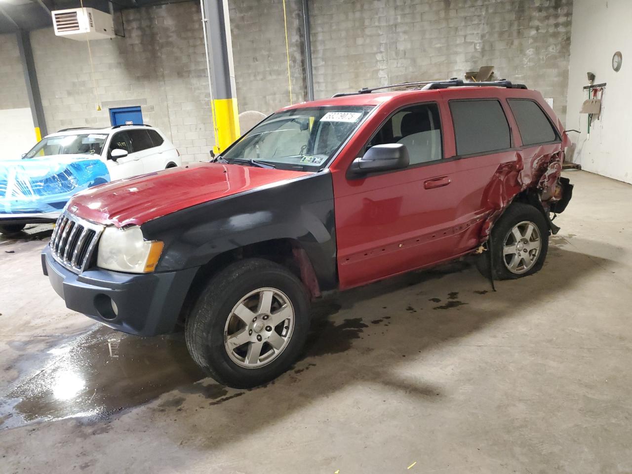 2010 Jeep Grand Cherokee Laredo, VIN 1J4PR4GK1AC134643 — Rear end