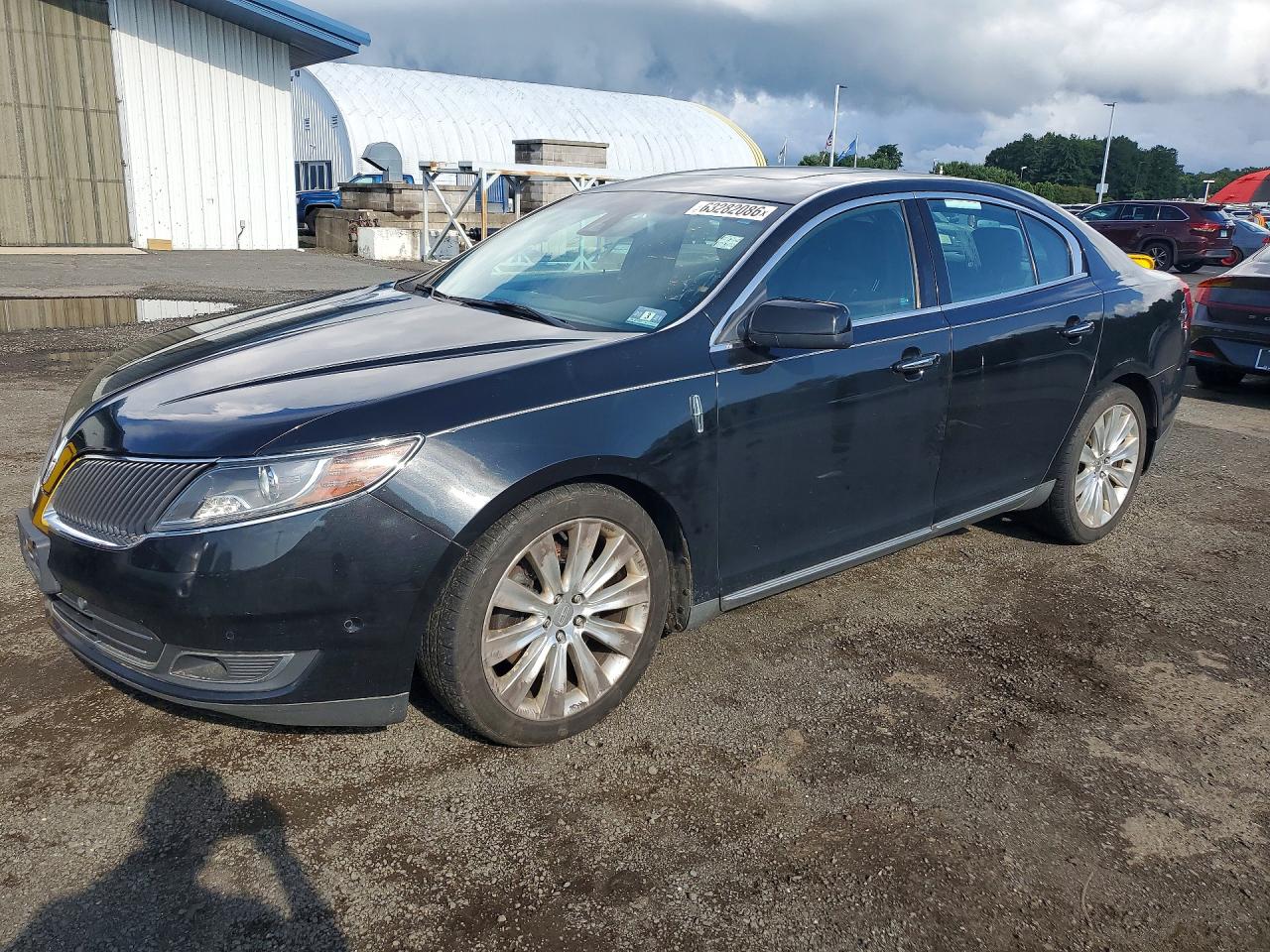 2014 Lincoln MKS EcoBoost, VIN 1LNHL9FT3EG600067 — Minor dents and scratches