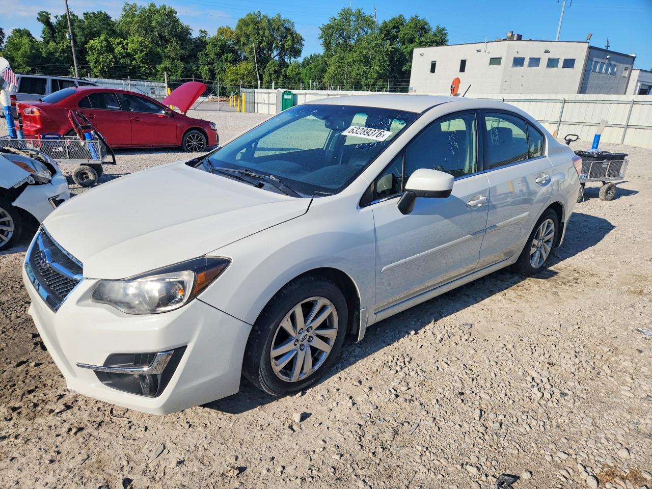 2016 Subaru Impreza Premium, VIN JF1GJAB69GH017013 — Перед