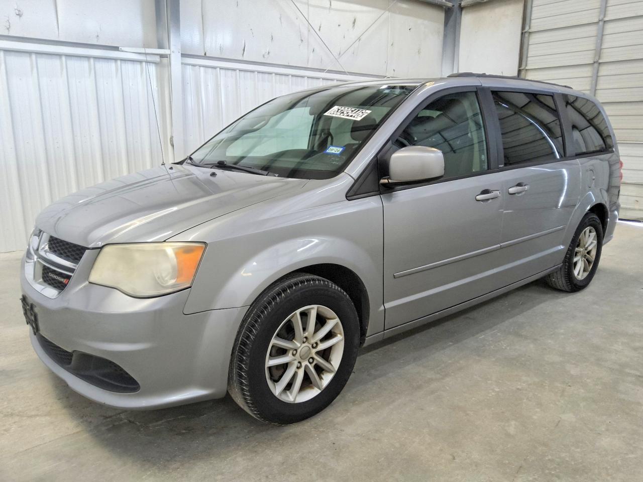 2013 Dodge Grand Caravan SXT, VIN 2C4RDGCG6DR669172 — Minor dents and scratches