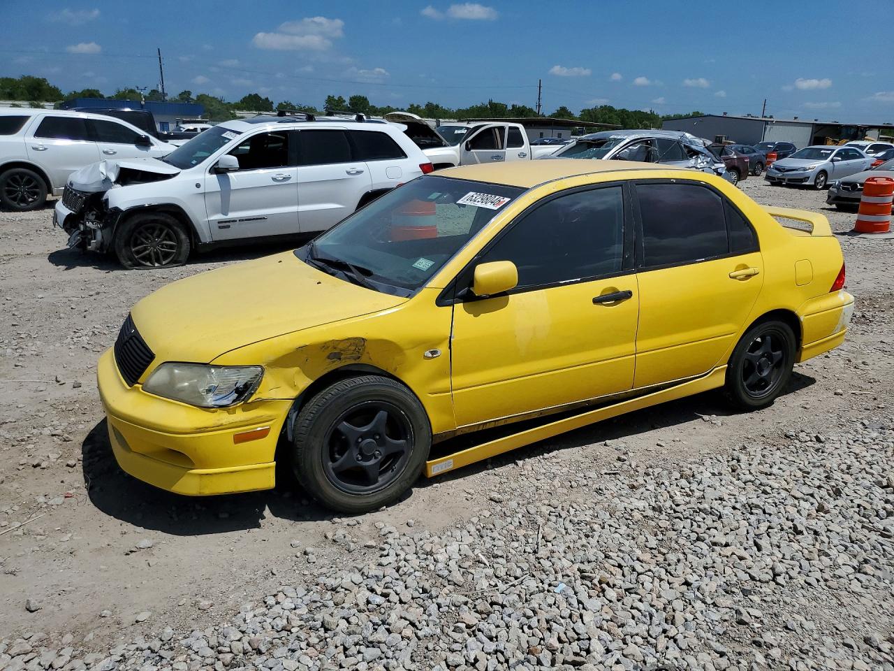 2003 Mitsubishi Lancer OZ-Rally, VIN JA3AJ86E63U088003 — Бок