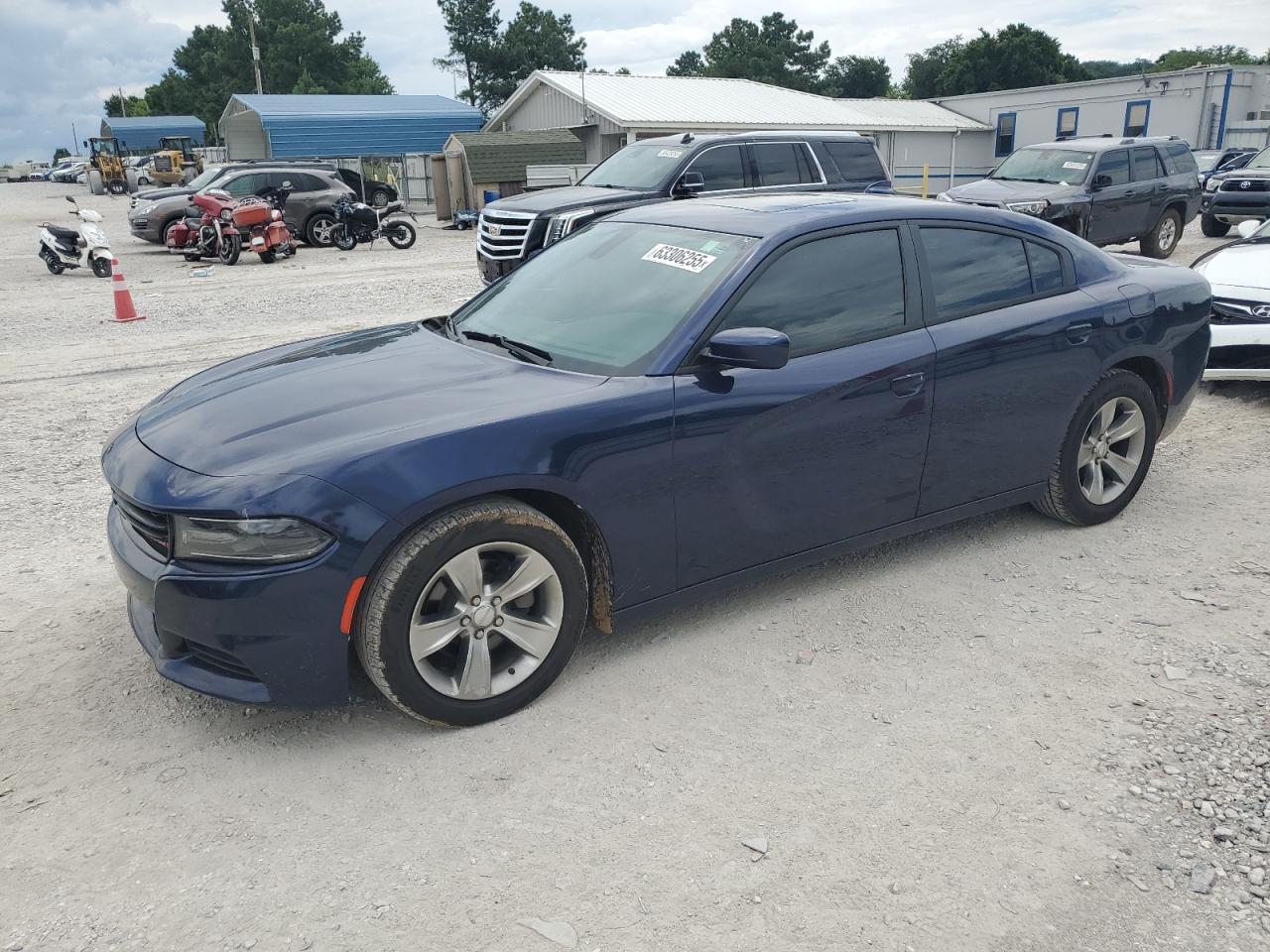 2015 Dodge Charger SXT, VIN 2C3CDXHG9FH801286 — Hail