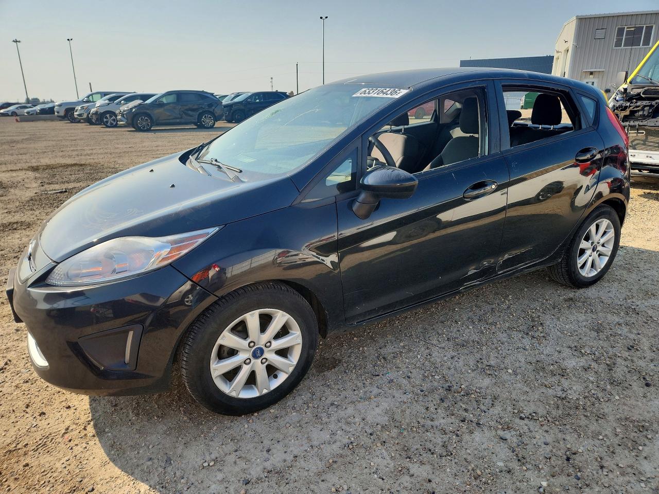 2012 Ford Fiesta SE, VIN 3FADP4EJ8CM192961 — Vandalism