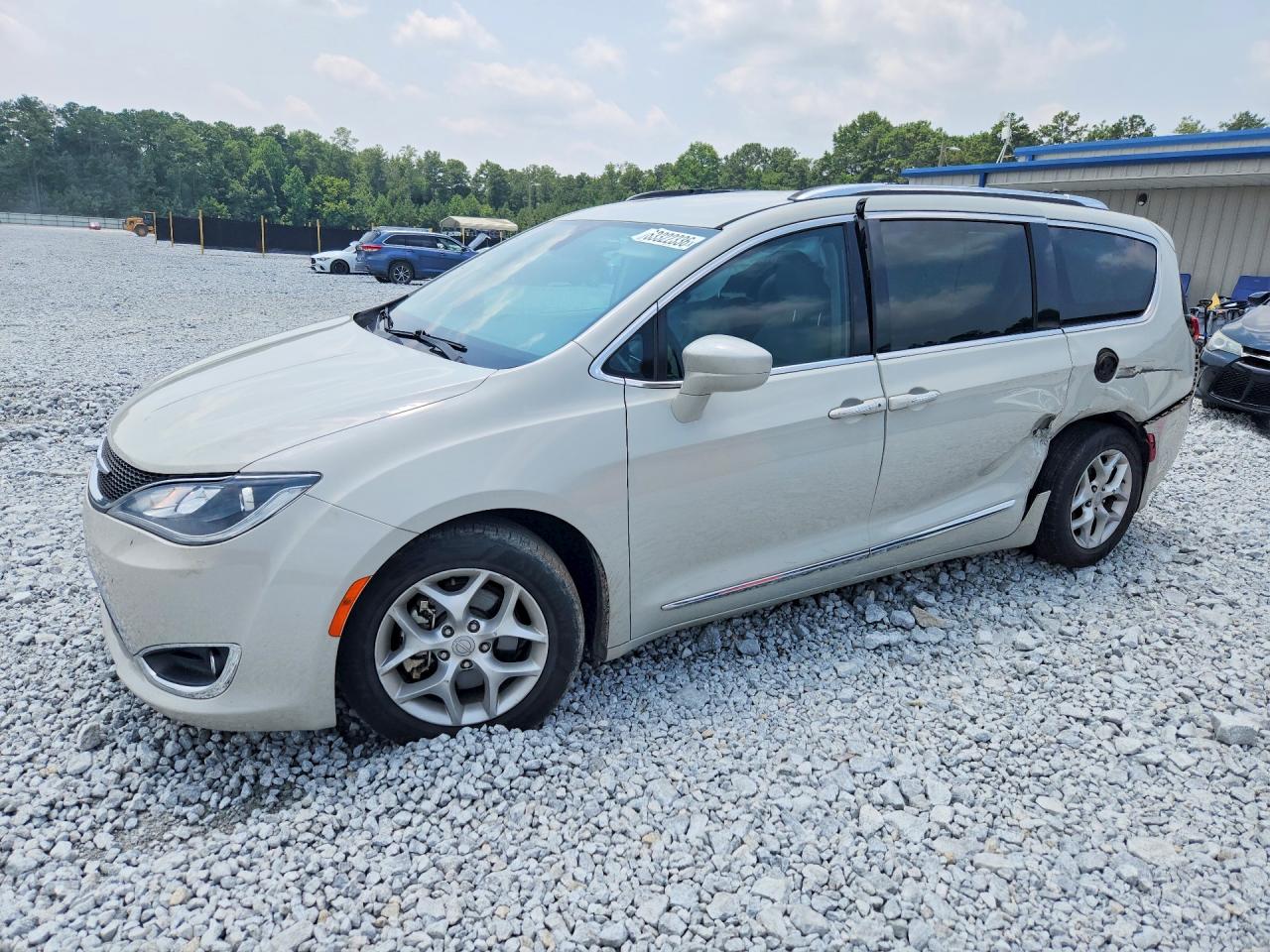 2017 Chrysler Pacifica Touring L Plus, VIN 2C4RC1EG1HR669261 — Side