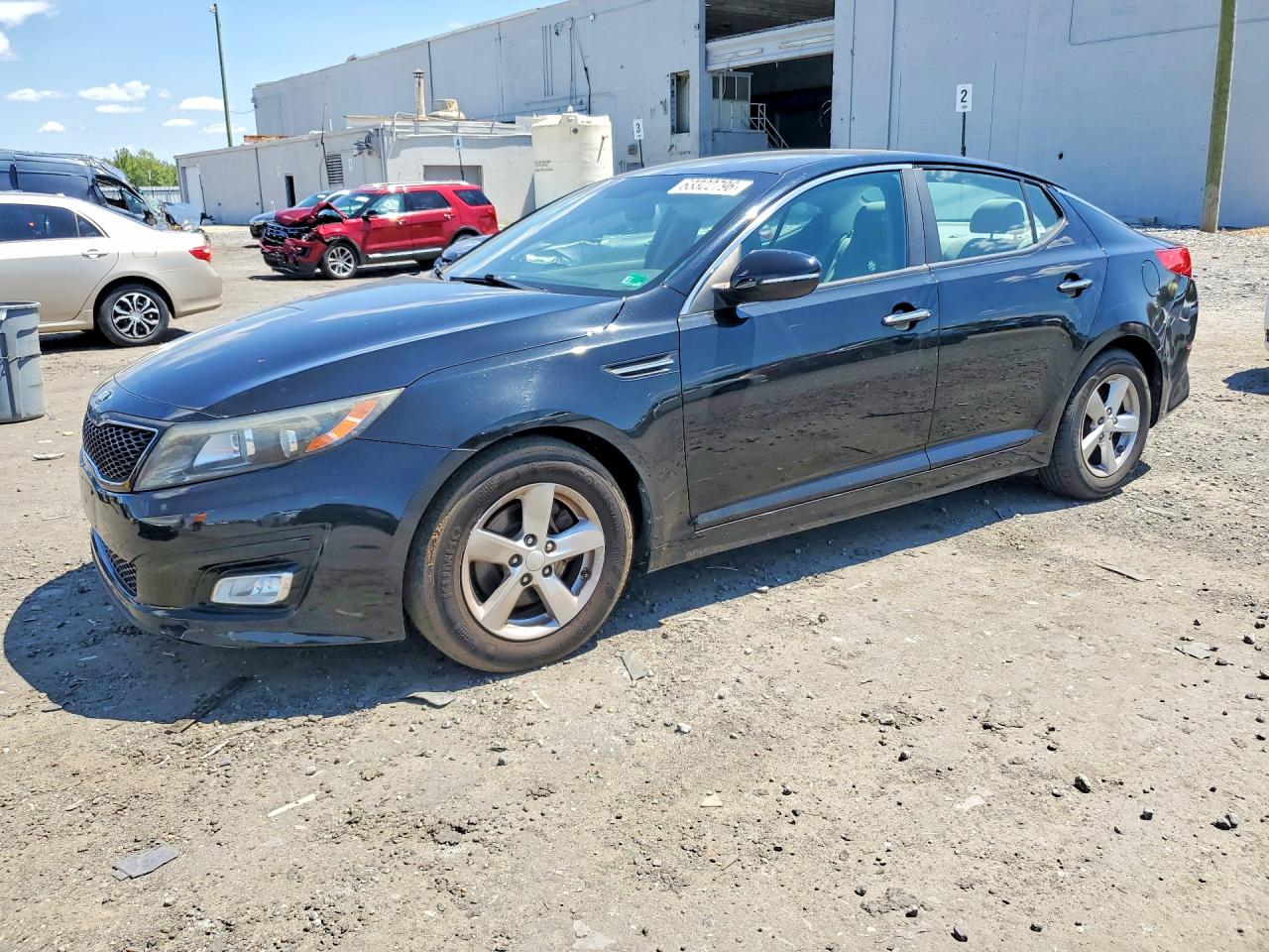 2015 Kia Optima LX, VIN 5XXGM4A70FG465441 — Side