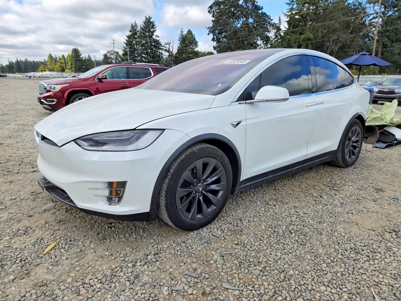 2019 Tesla Model X 75D, VIN 5YJXCAE23KF157631 — Front end