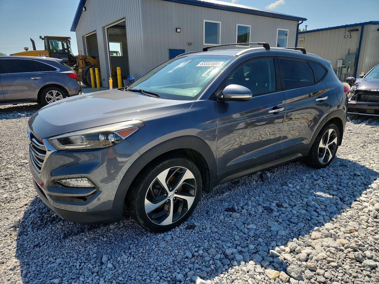2016 Hyundai Tucson Limited, VIN KM8J3CA2XGU251698 — Side