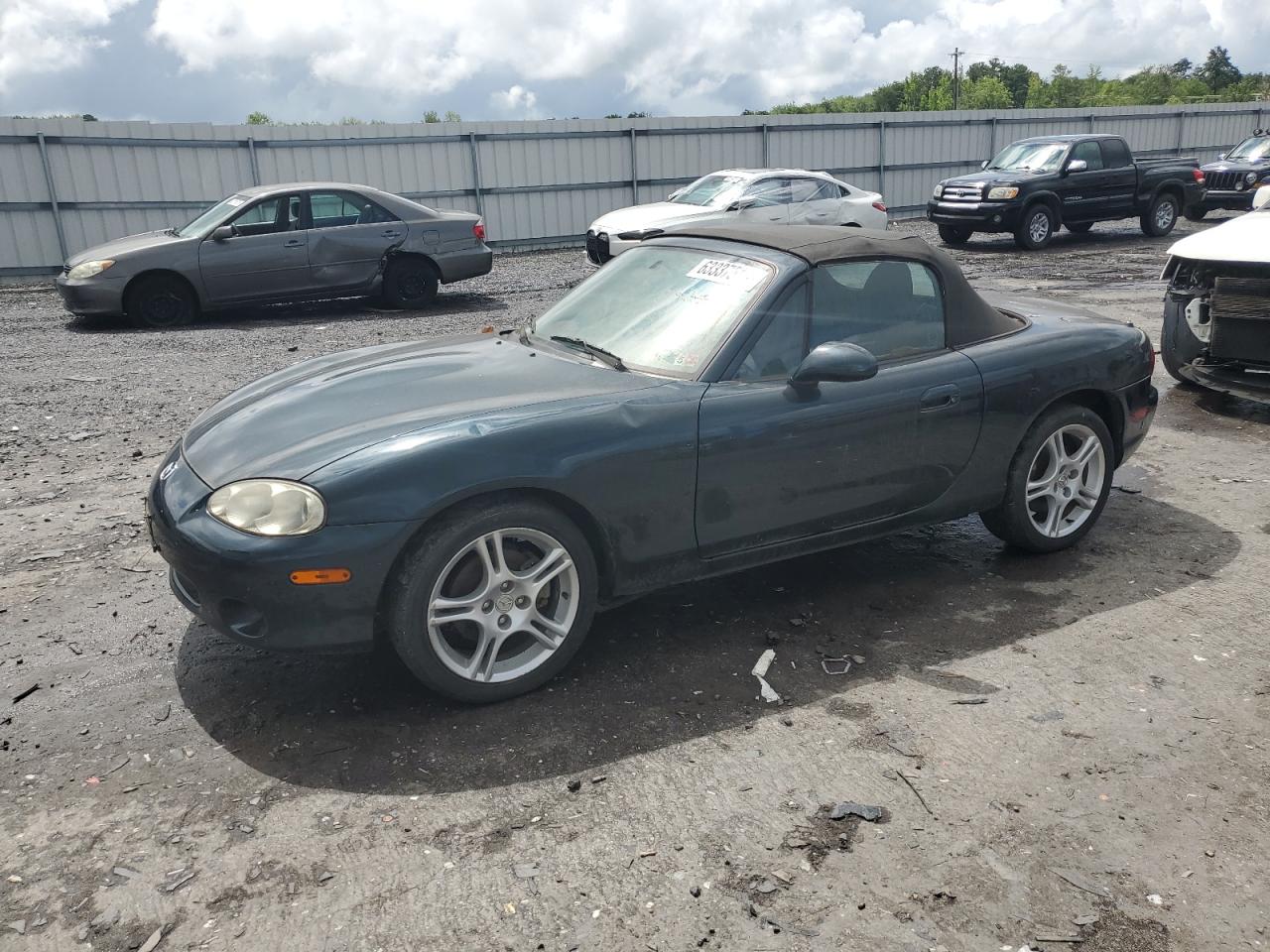 2005 Mazda MX-5 Miata LS, VIN JM1NB353X50410655 — Interior fire