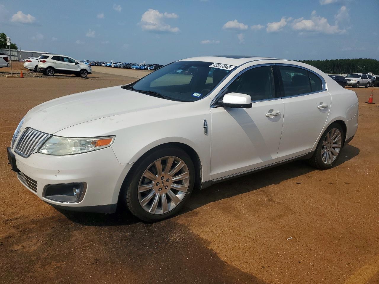 2012 Lincoln MKS, VIN 1LNHL9DRXCG801825 — Minor dents and scratches