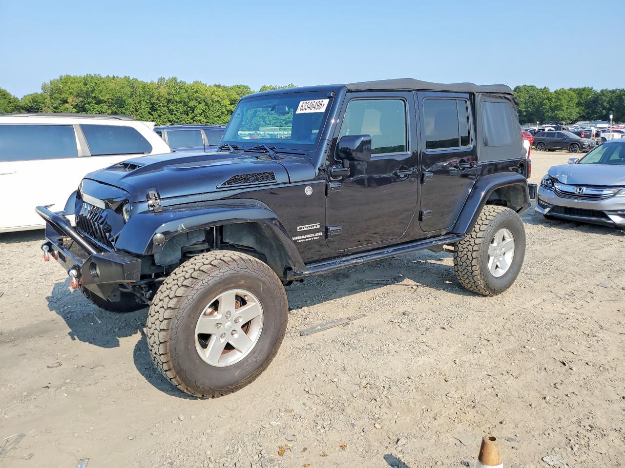 2015 Jeep Wrangler Unlimited Sport, VIN 1C4BJWDG4FL740772 — Мелкие вмятины и царапины