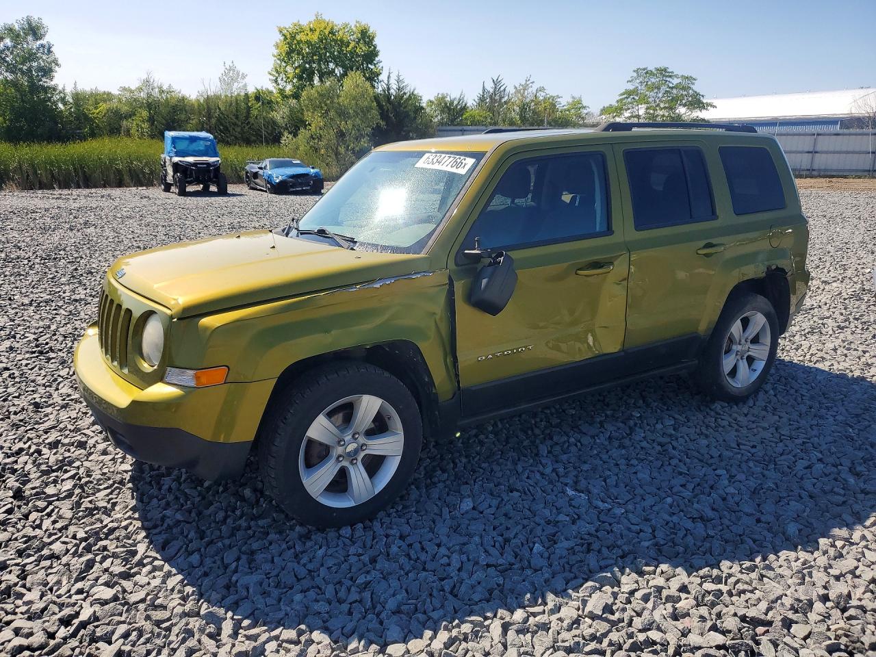 2012 Jeep Patriot Latitude, VIN 1C4NJPFB3CD631701 — Side