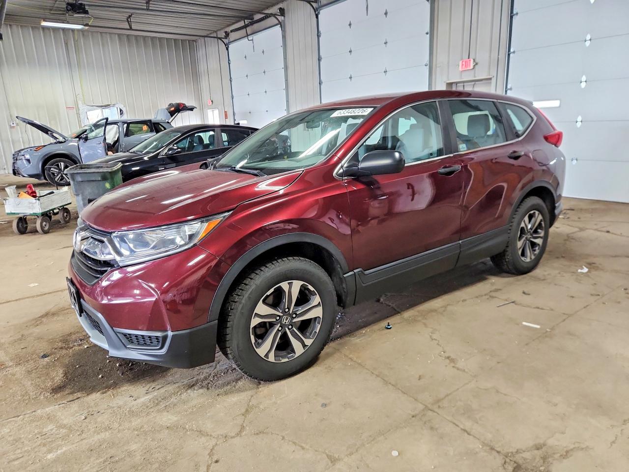 2018 Honda CR-V LX, VIN 2HKRW6H37JH213037 — Side