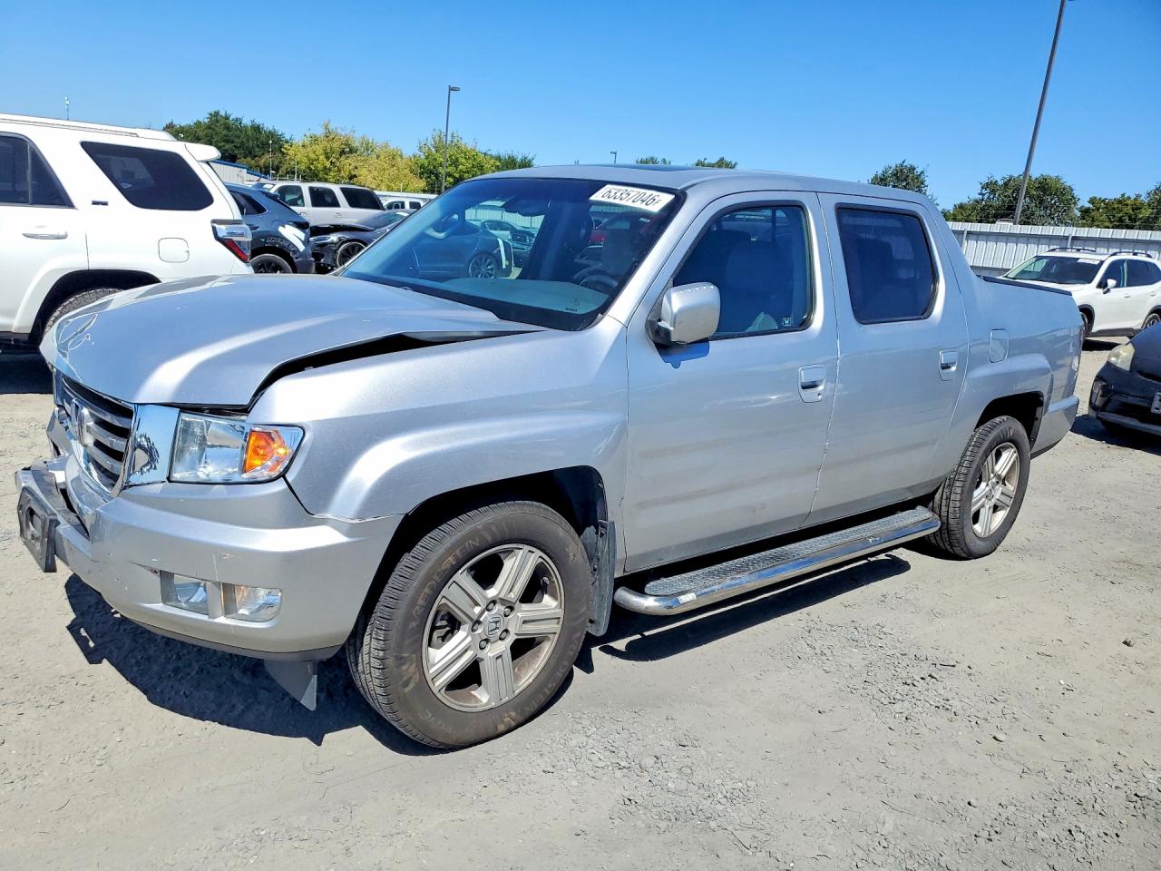 2012 Honda Ridgeline RTL, VIN 5FPYK1F50CB454574 — Front end