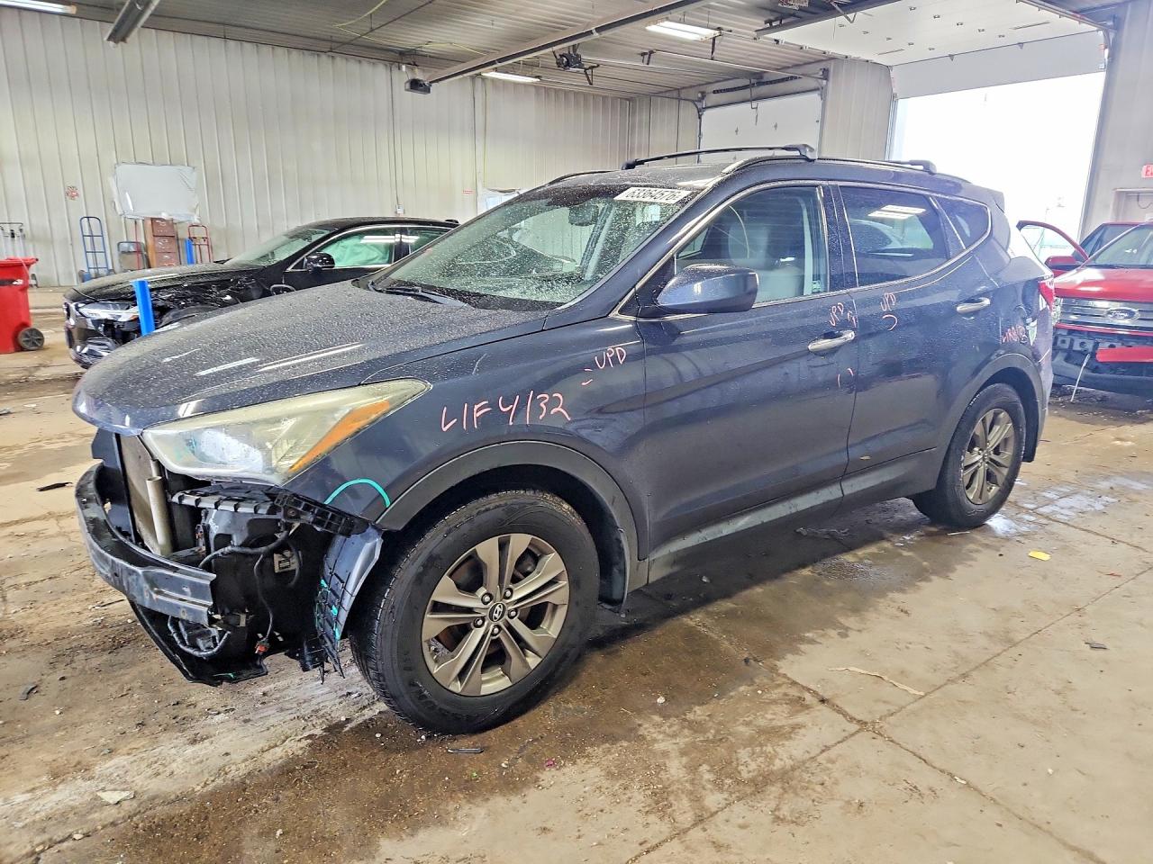 2013 Hyundai Santa Fe Sport, VIN 5XYZUDLB5DG098071 — Front end