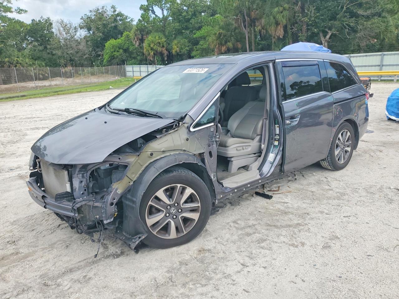 2015 Honda Odyssey Touring Elite, VIN 5FNRL5H99FB056186 — Front end