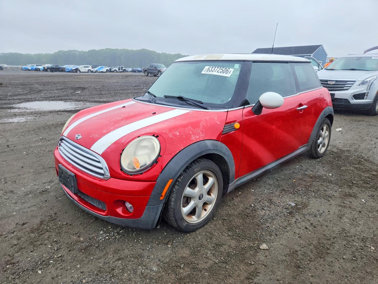 2009 MINI Hardtop, VIN WMWMF33529TW76970 — Minor dents and scratches