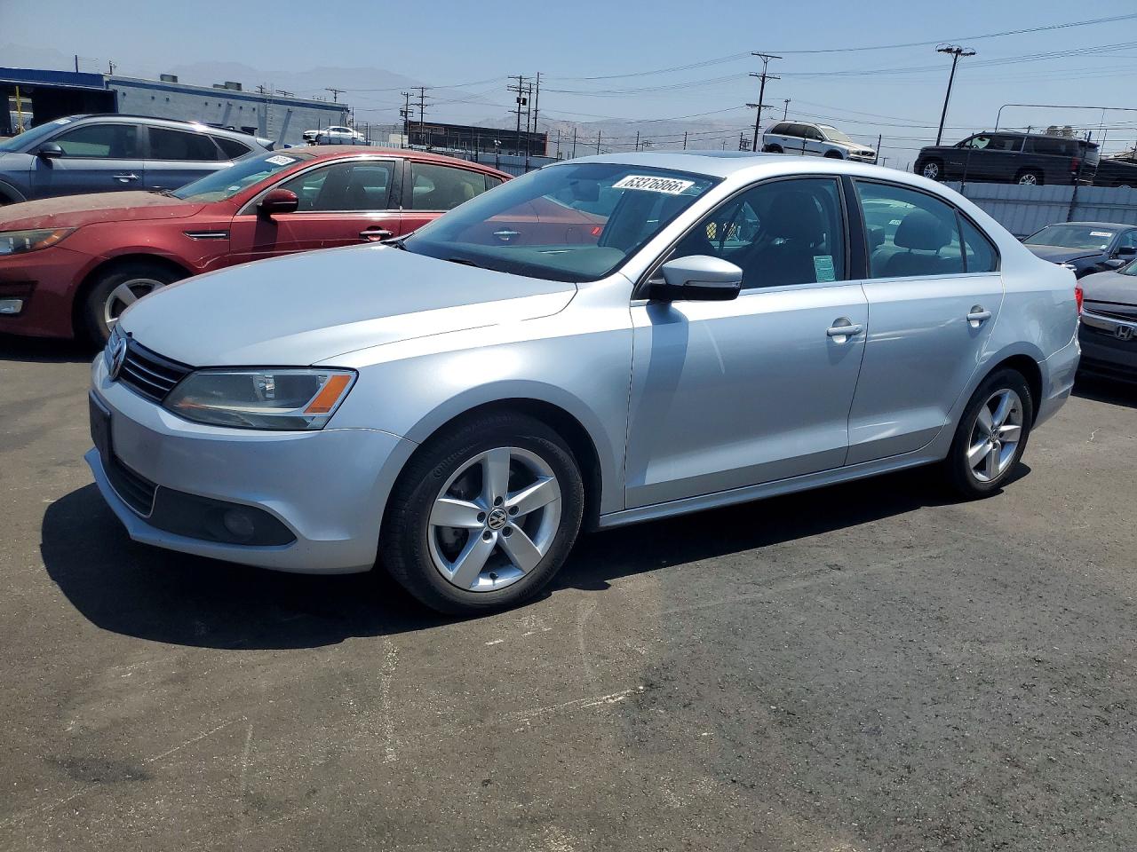 2013 Volkswagen Jetta TDI w/Premium/Nav, VIN 3VWLL7AJXDM414844 — Minor dents and scratches