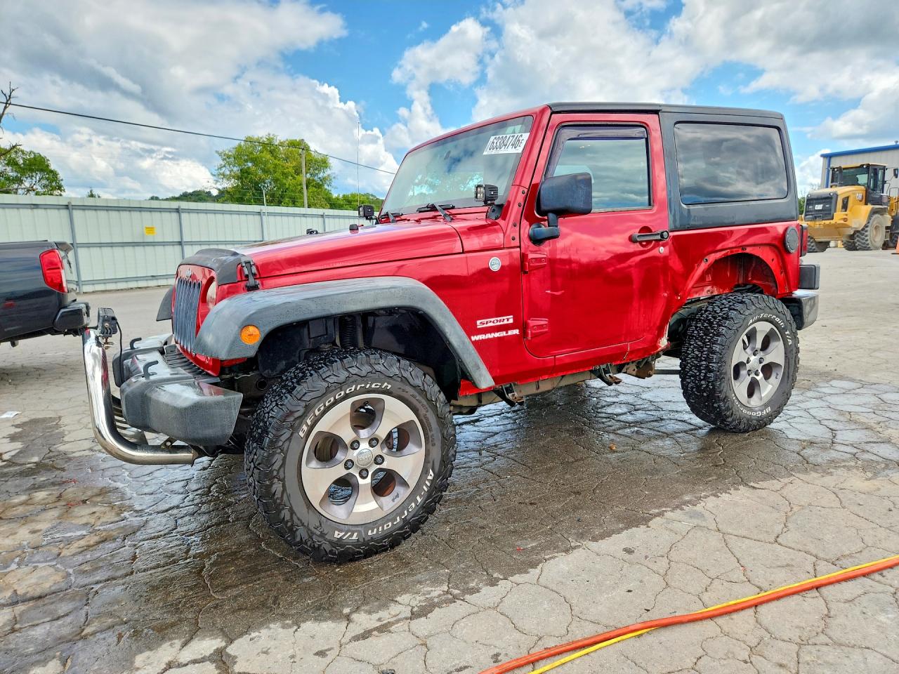 2011 Jeep Wrangler Sport, VIN 1J4AA2D15BL620872 — Side