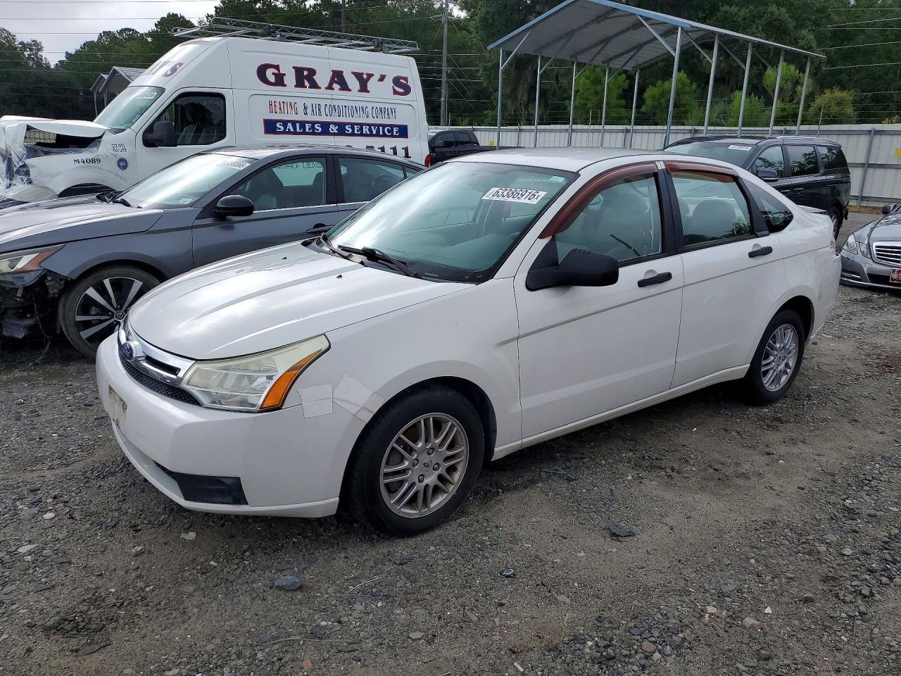 2011 Ford Focus SE, VIN 1FAHP3FN6BW174664 — Rear end