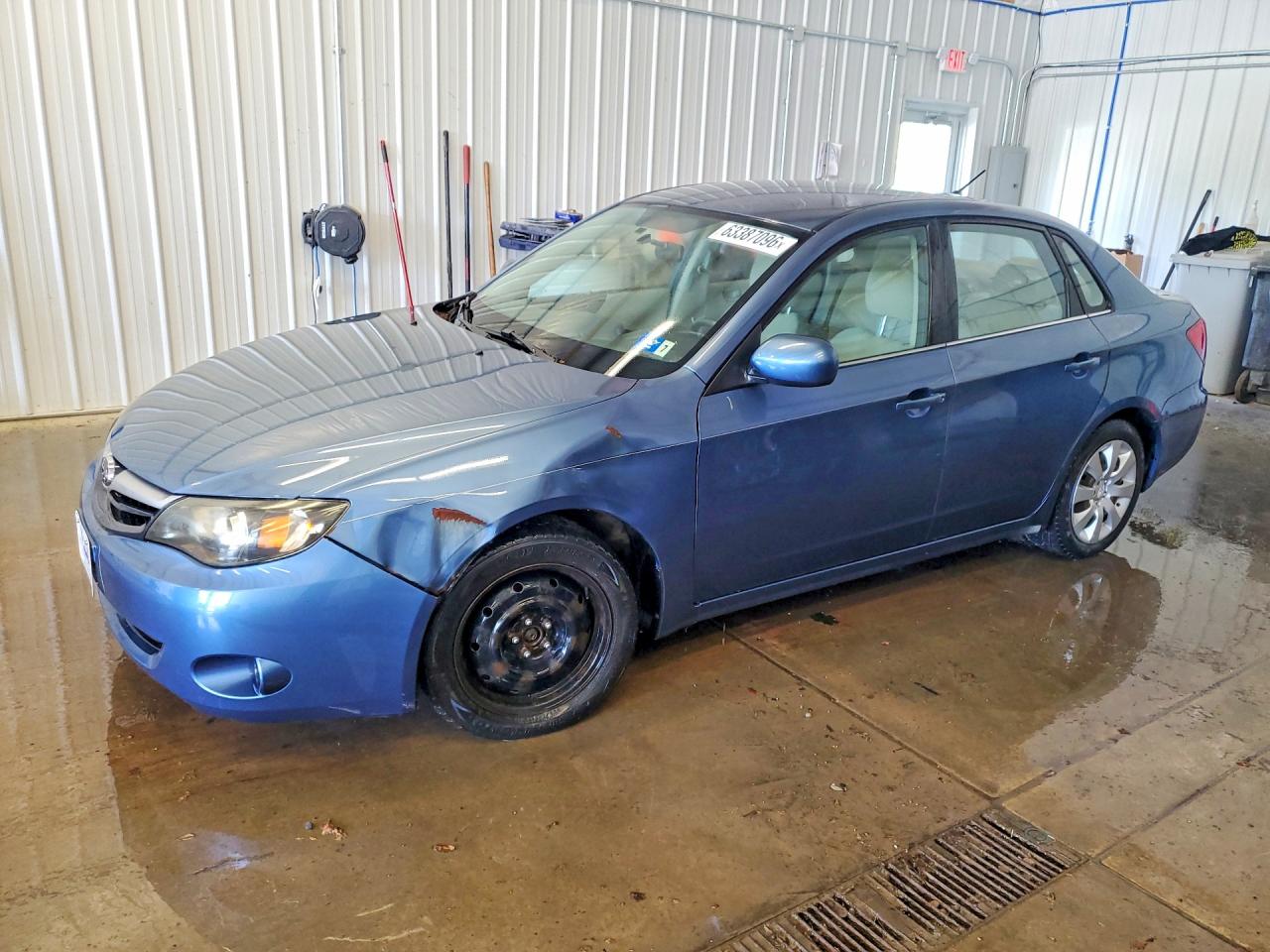 2010 Subaru Impreza i, VIN JF1GE6A6XAH507860 — Side
