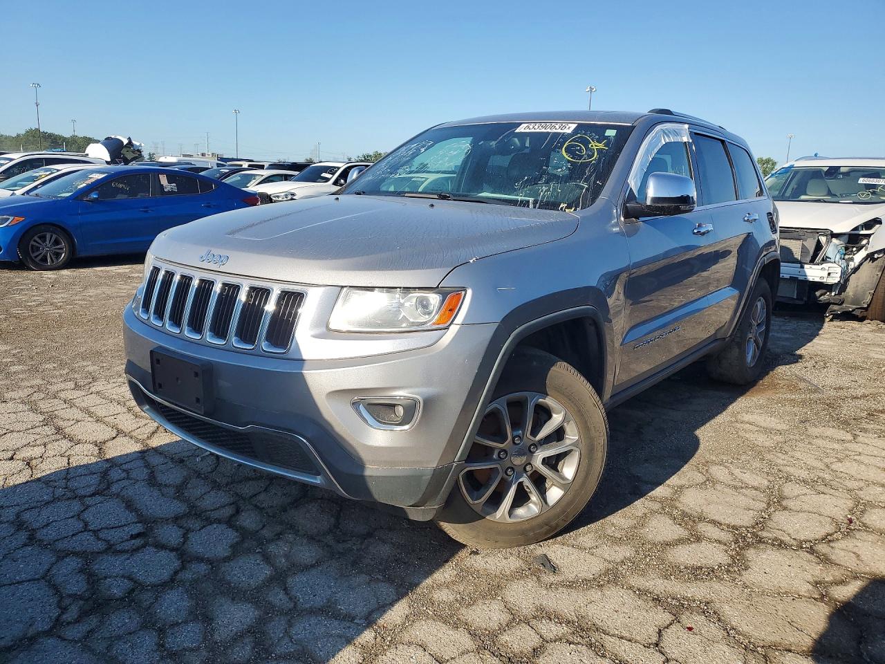 2014 Jeep Grand Cherokee Limited, VIN 1C4RJFBG9EC255012 — Side