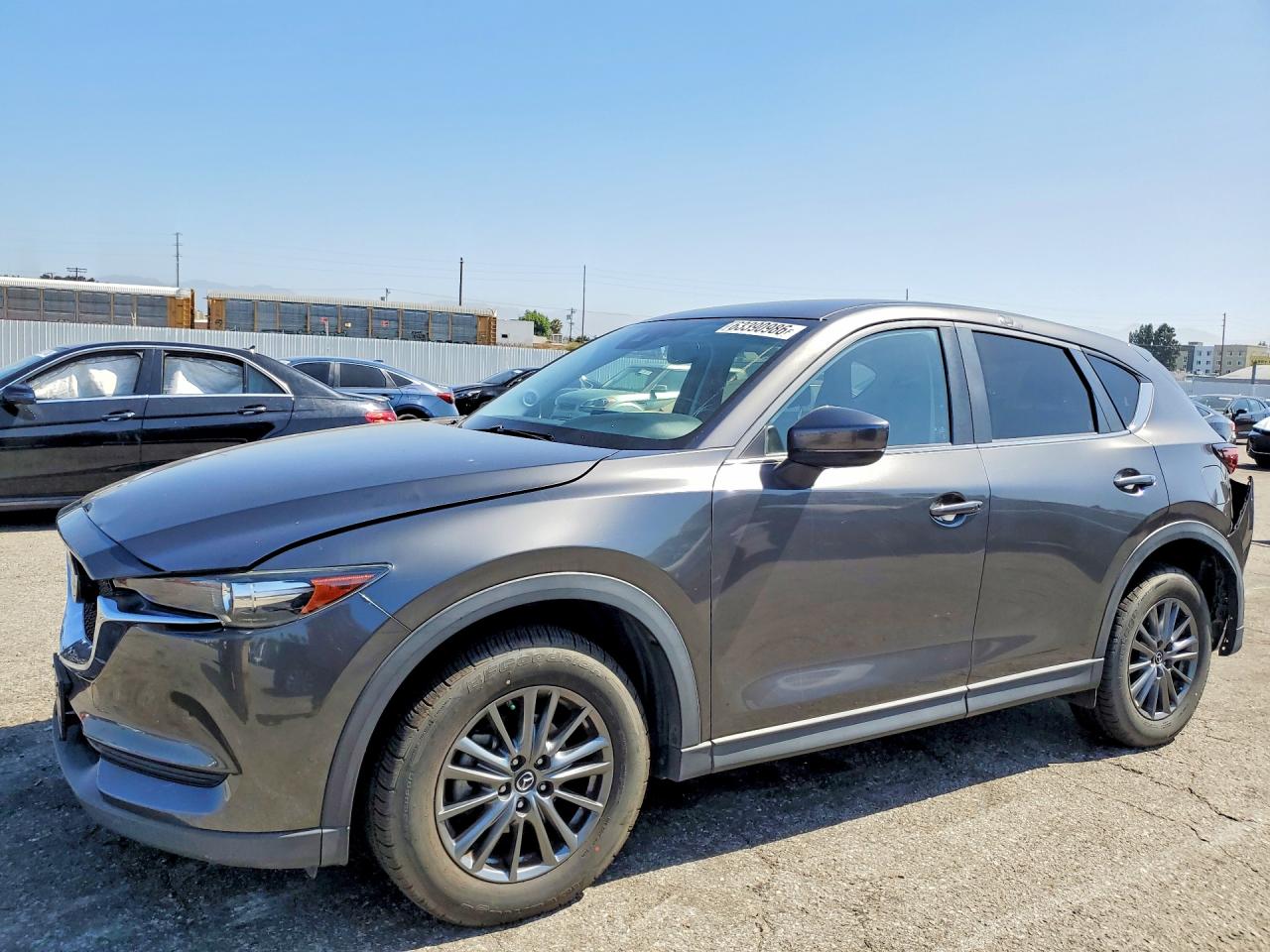 2017 Mazda CX-5 Touring, VIN JM3KFBCL0H0133899 — Rear end