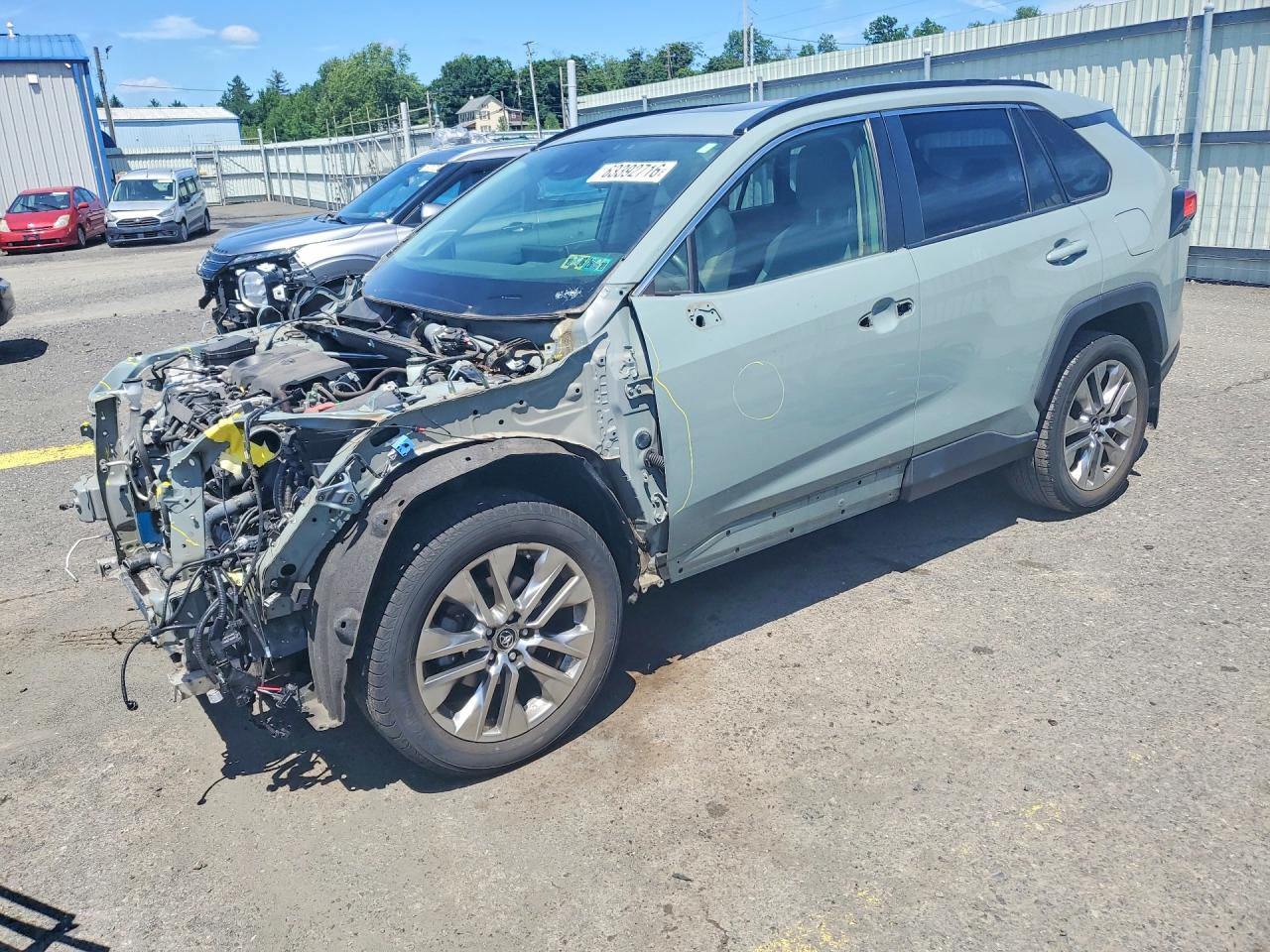 2019 Toyota RAV4 XLE Premium, VIN JTMA1RFV7KD517235 — Front end
