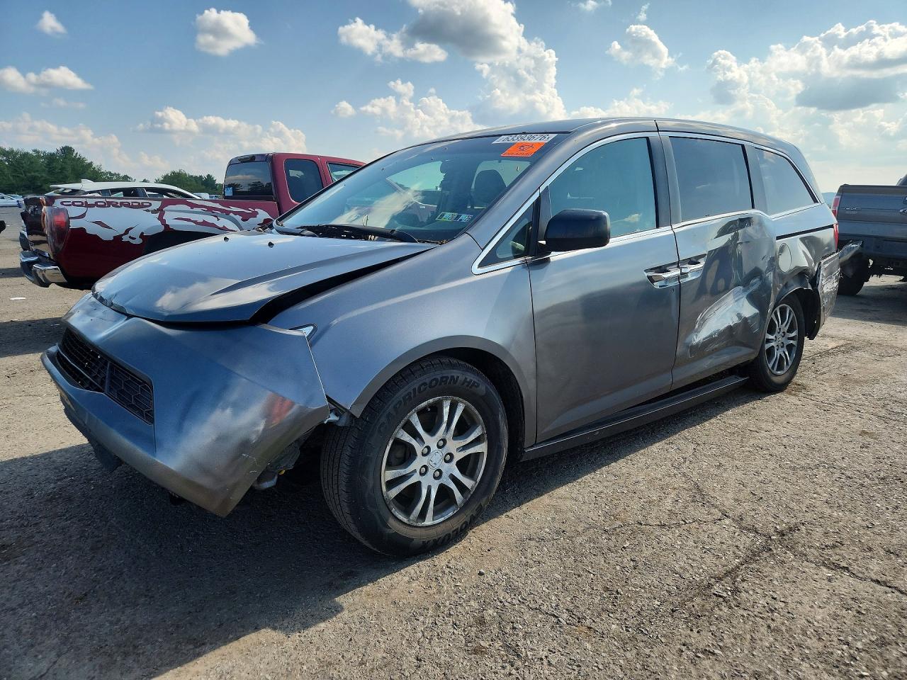 2011 Honda Odyssey EX, VIN 5FNRL5H42BB085091 — Side