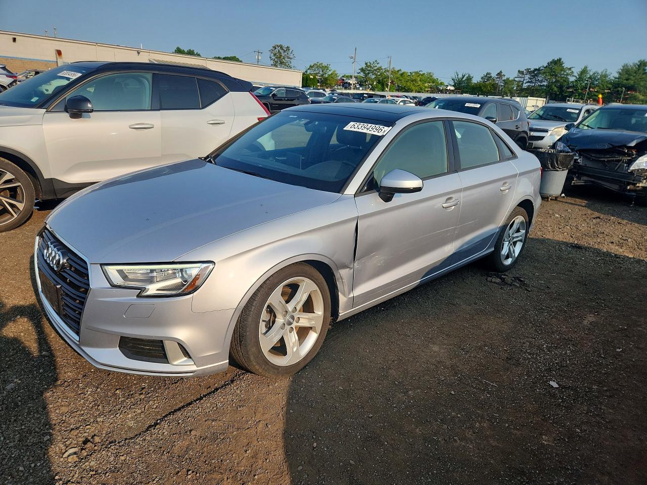 2017 Audi A3 Premium, VIN WAUB8GFF2H1074271 — Side