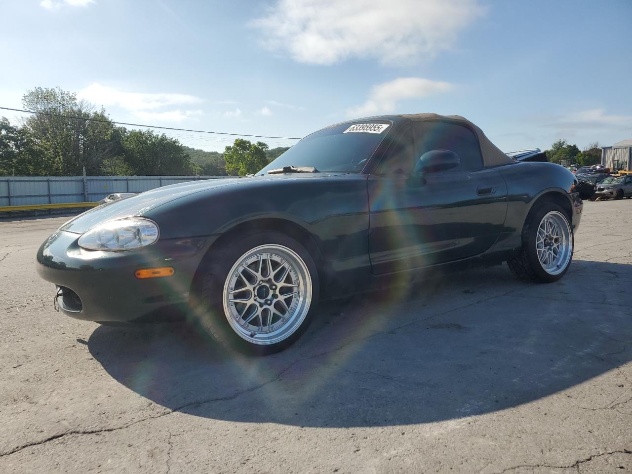 1999 Mazda MX-5 Miata, VIN JM1NB3535X0105602 — Rear end