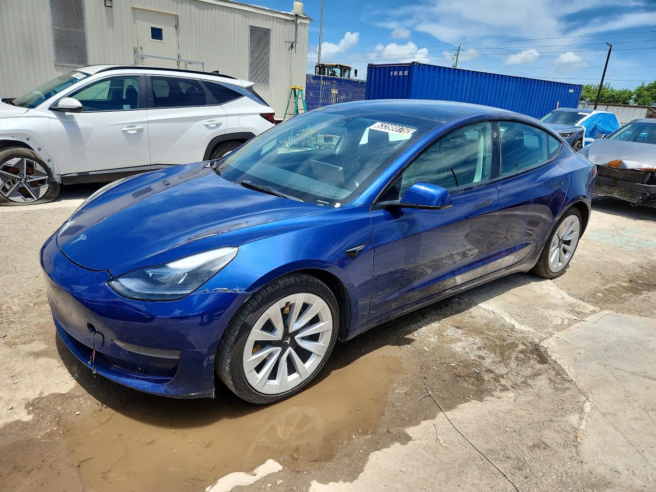 2023 Tesla Model 3, VIN 5YJ3E1EA5PF433931 — Front end