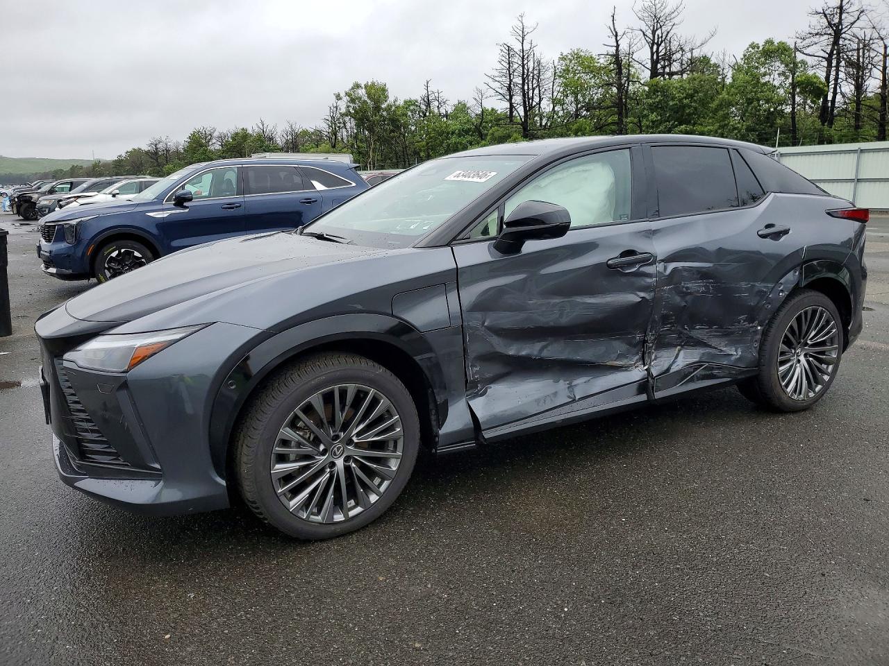 2023 Lexus RZ 450e Premium, VIN JTJAAAAB8PA020635 — Side