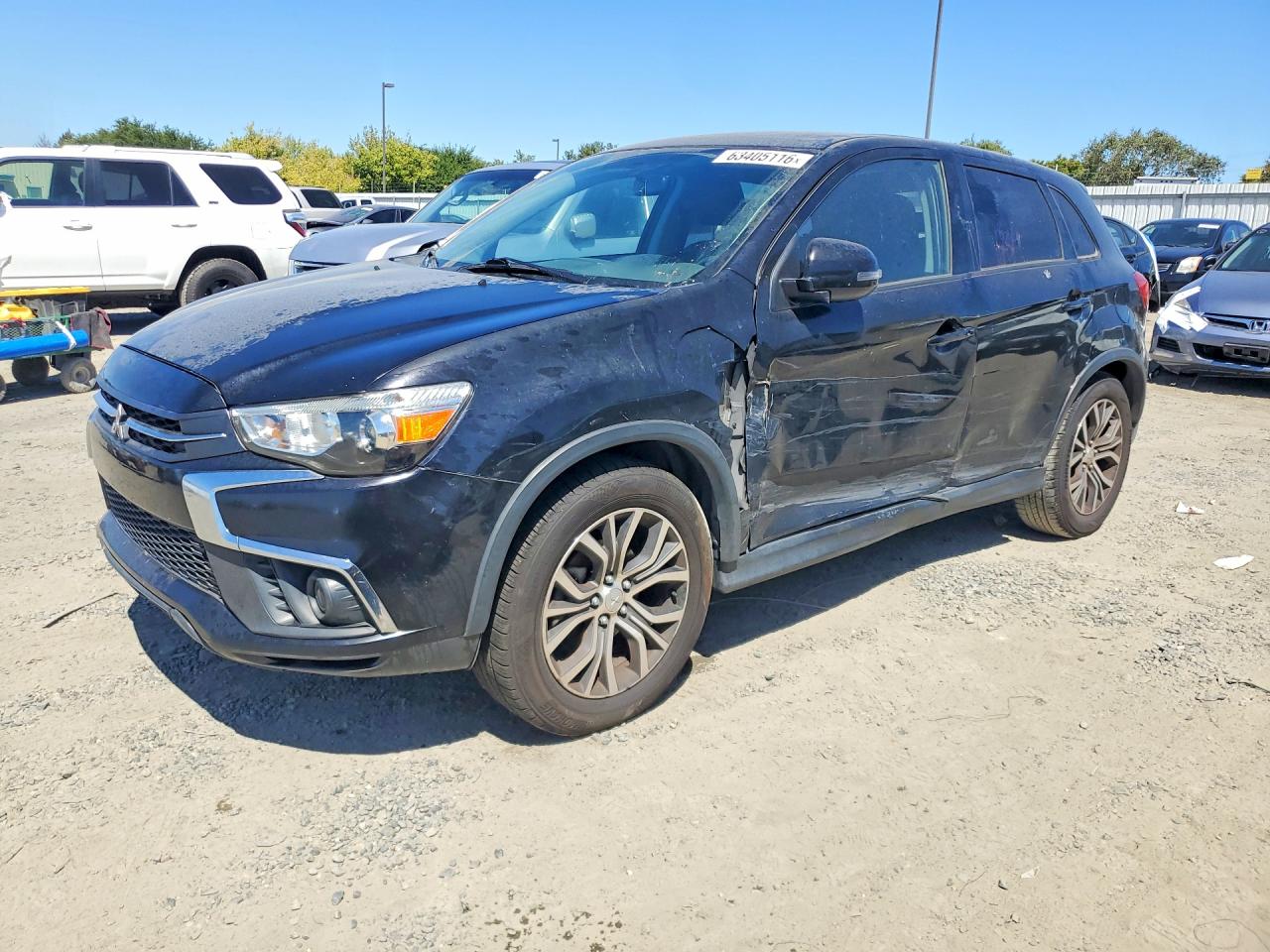 2019 Mitsubishi Outlander ES, VIN JA4AP3AU3KU003158 — Side