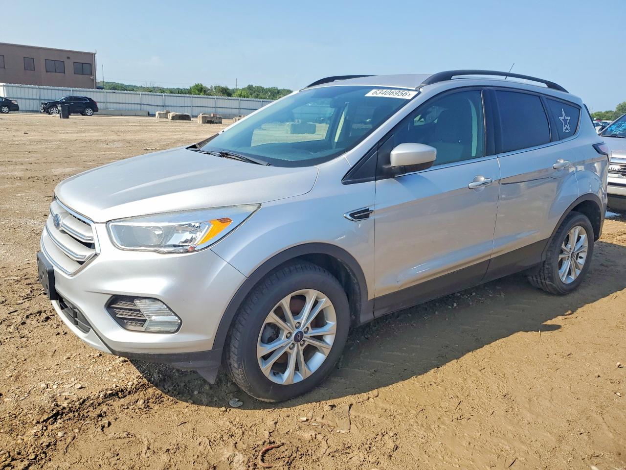 2018 Ford Escape SE, VIN 1FMCU9GD4JUC13411 — Side