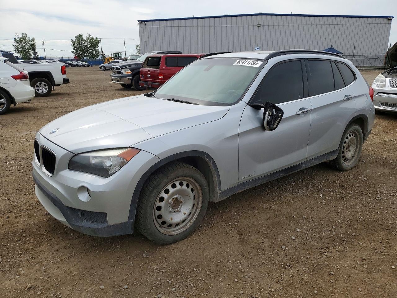 2014 BMW X1 xDrive28i, VIN WBAVL1C55EVR93044 — Vandalism