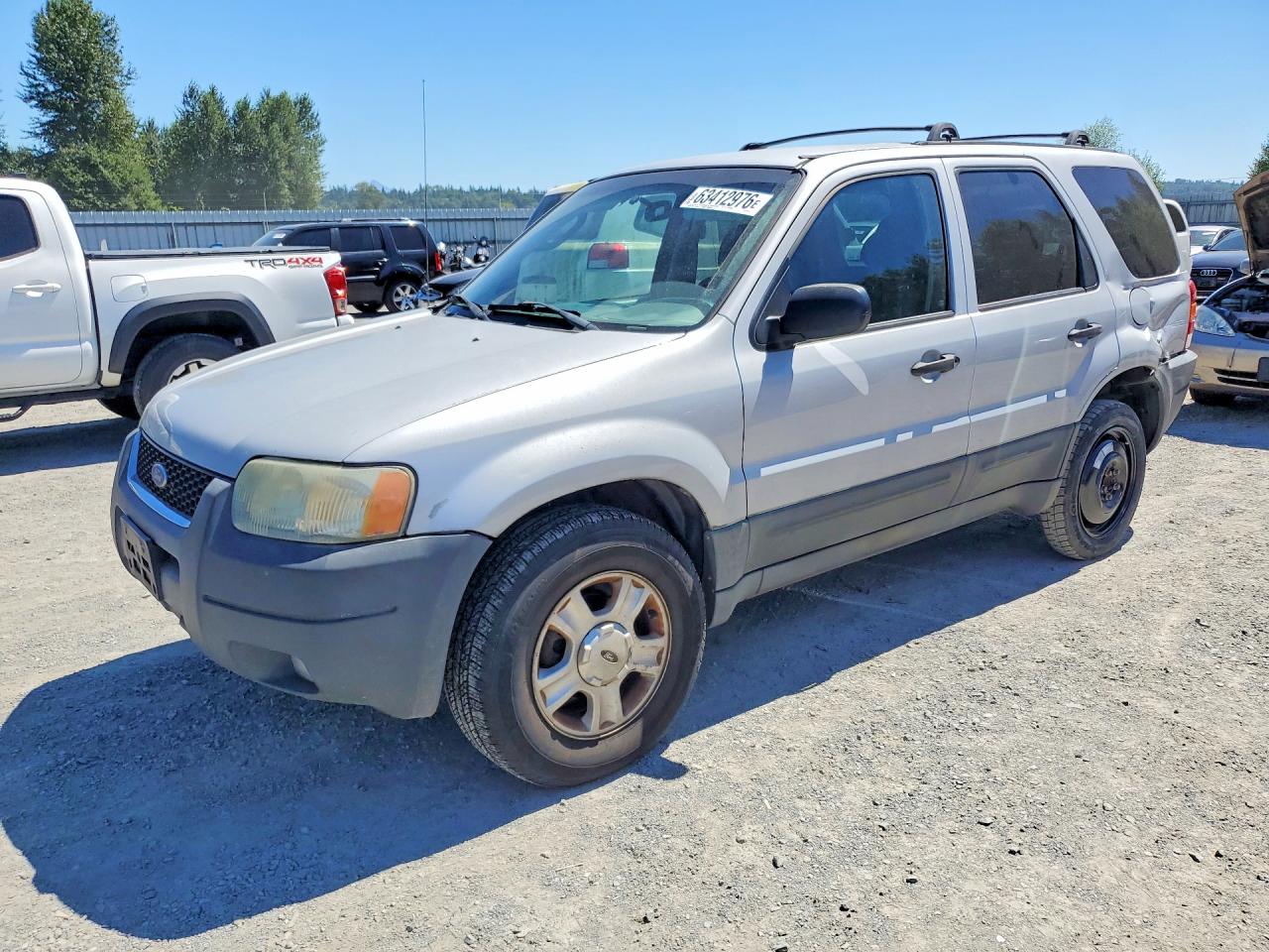 2003 Ford Escape XLT Popular, VIN 1FMYU03133KD07226 — Side