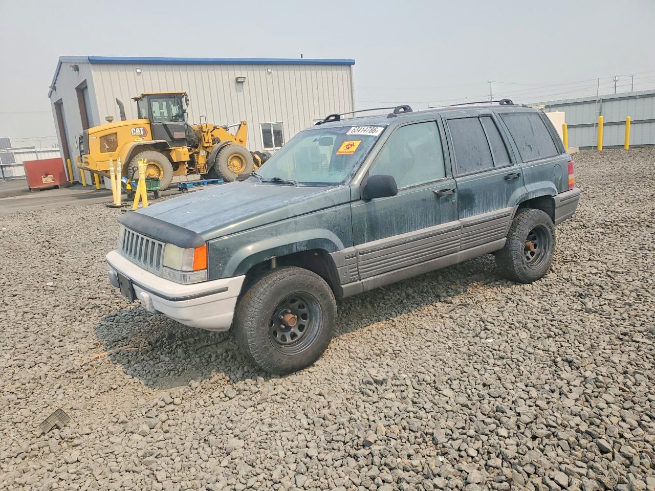 1995 Jeep Grand Cherokee Laredo, VIN 1J4GZ58S4SC649397 — Side