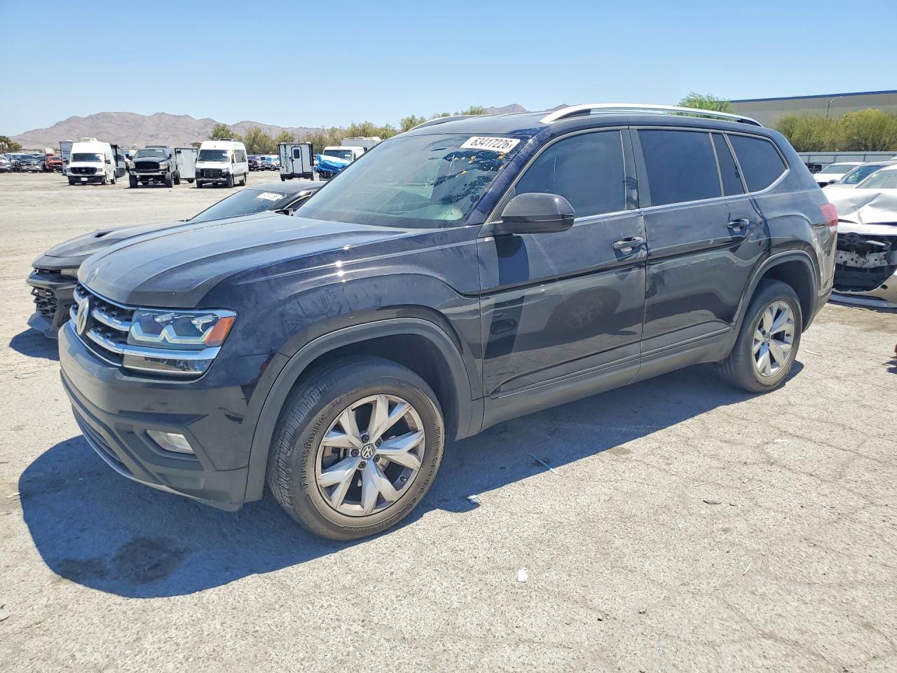 2018 Volkswagen Atlas SE, VIN 1V2LR2CA4JC586400 — Бок