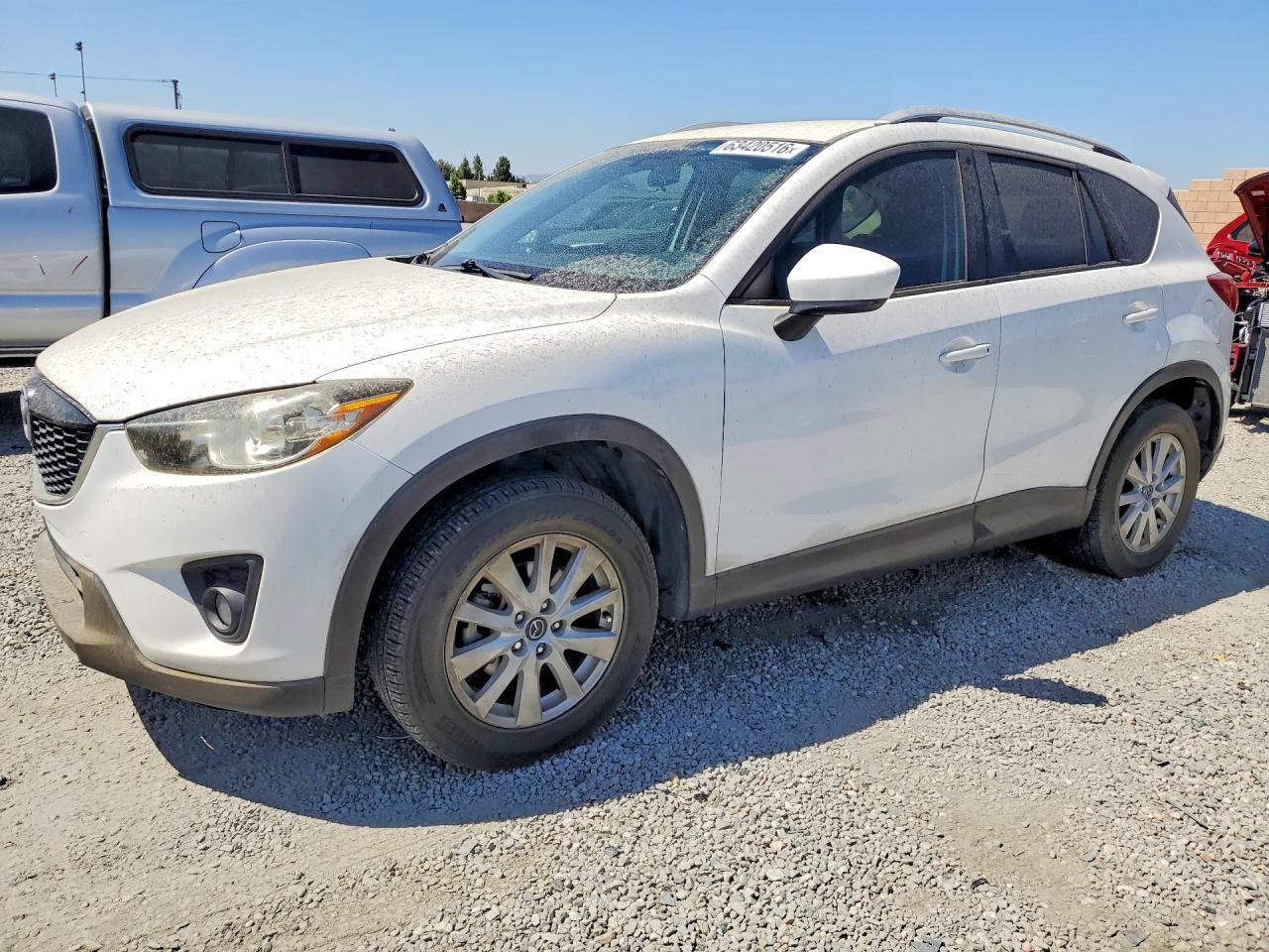 2014 Mazda CX-5 Touring, VIN JM3KE4CY9E0325974 — Front end