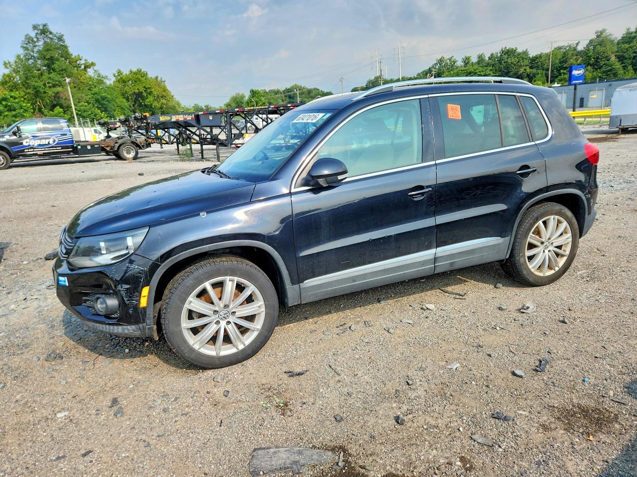 2013 Volkswagen Tiguan S, VIN WVGBV7AX5DW556916 — Minor dents and scratches