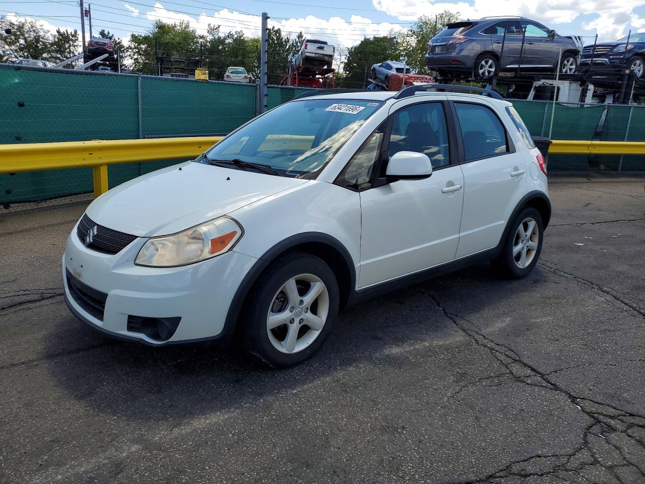 2009 Suzuki SX4 FWD, VIN JS2YA413096201610 — Град