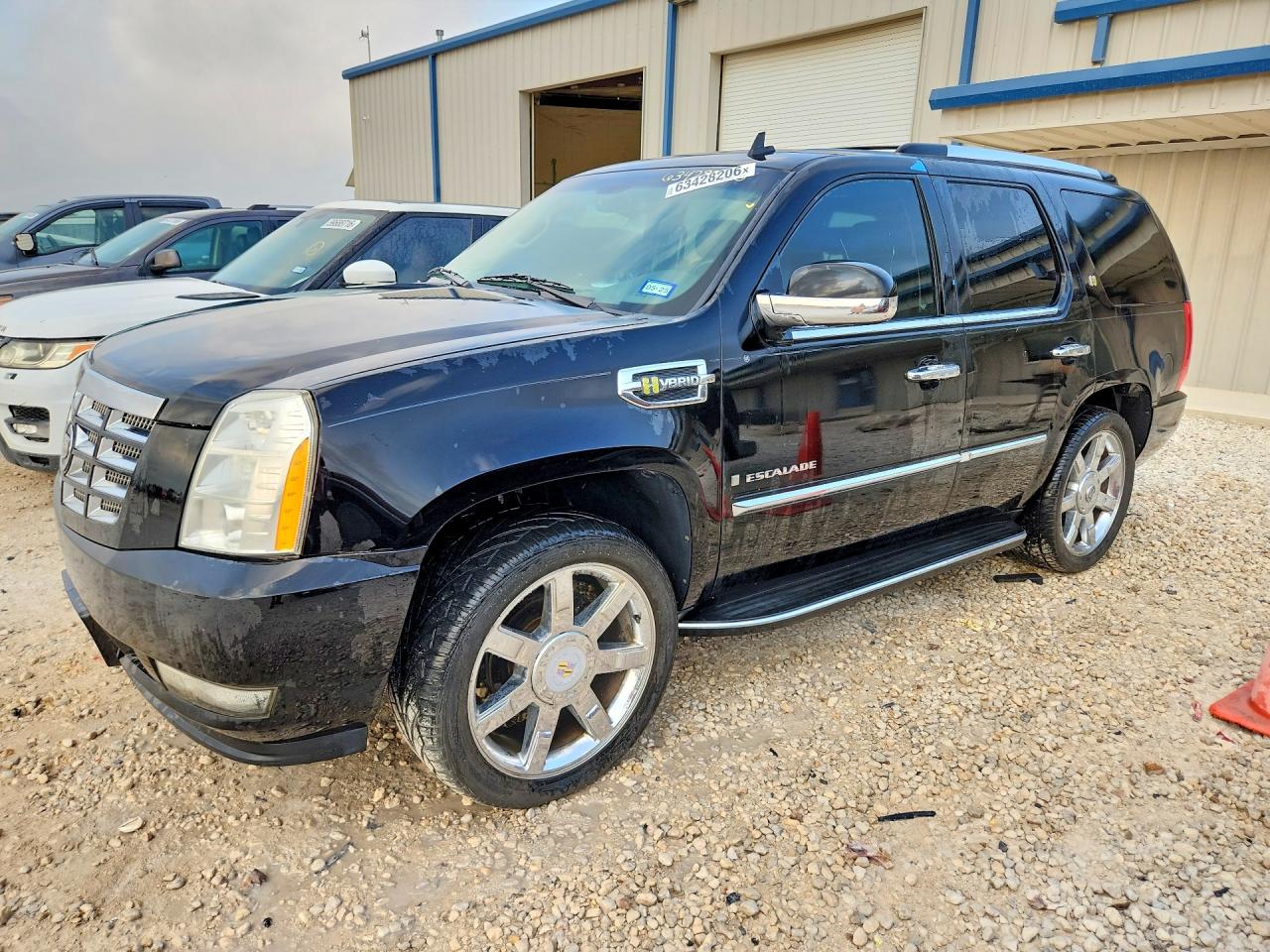 2009 Cadillac Escalade, VIN 1GYFC43579R197834 — Minor dents and scratches