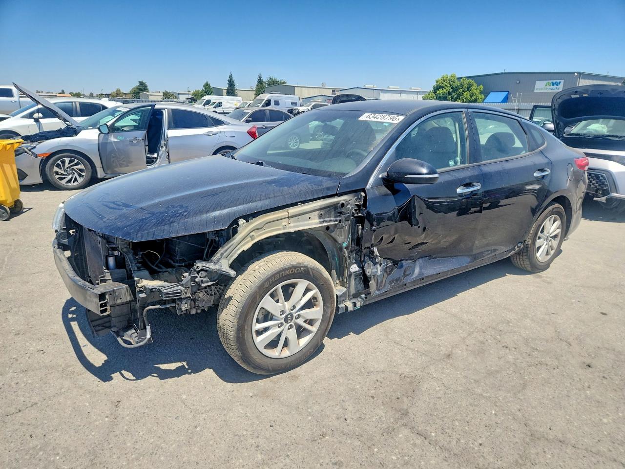 2017 Kia Optima LX, VIN 5XXGT4L36HG150580 — Front end