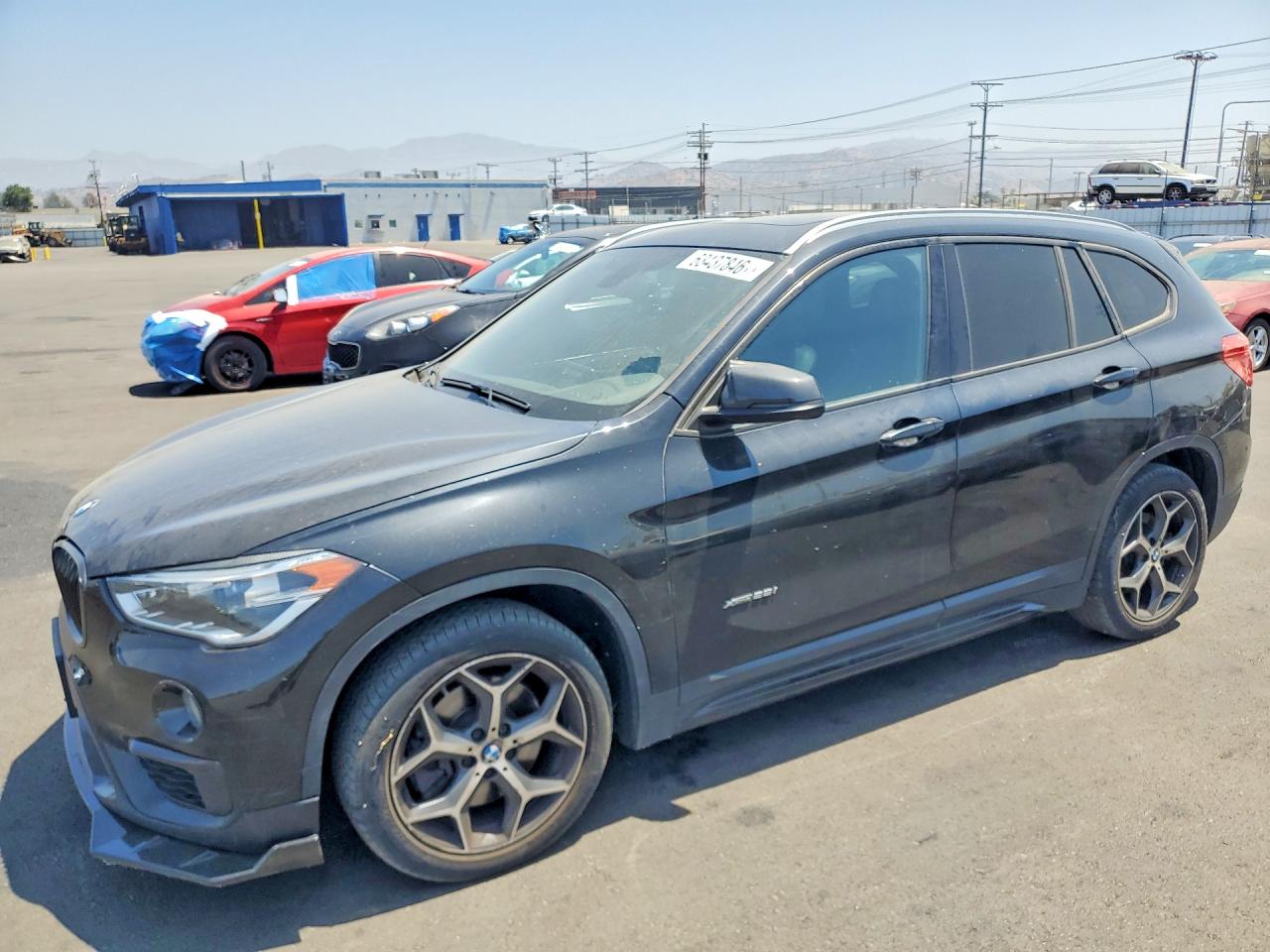 2016 BMW X1 xDrive28i, VIN WBXHT3C36GP884175 — Minor dents and scratches
