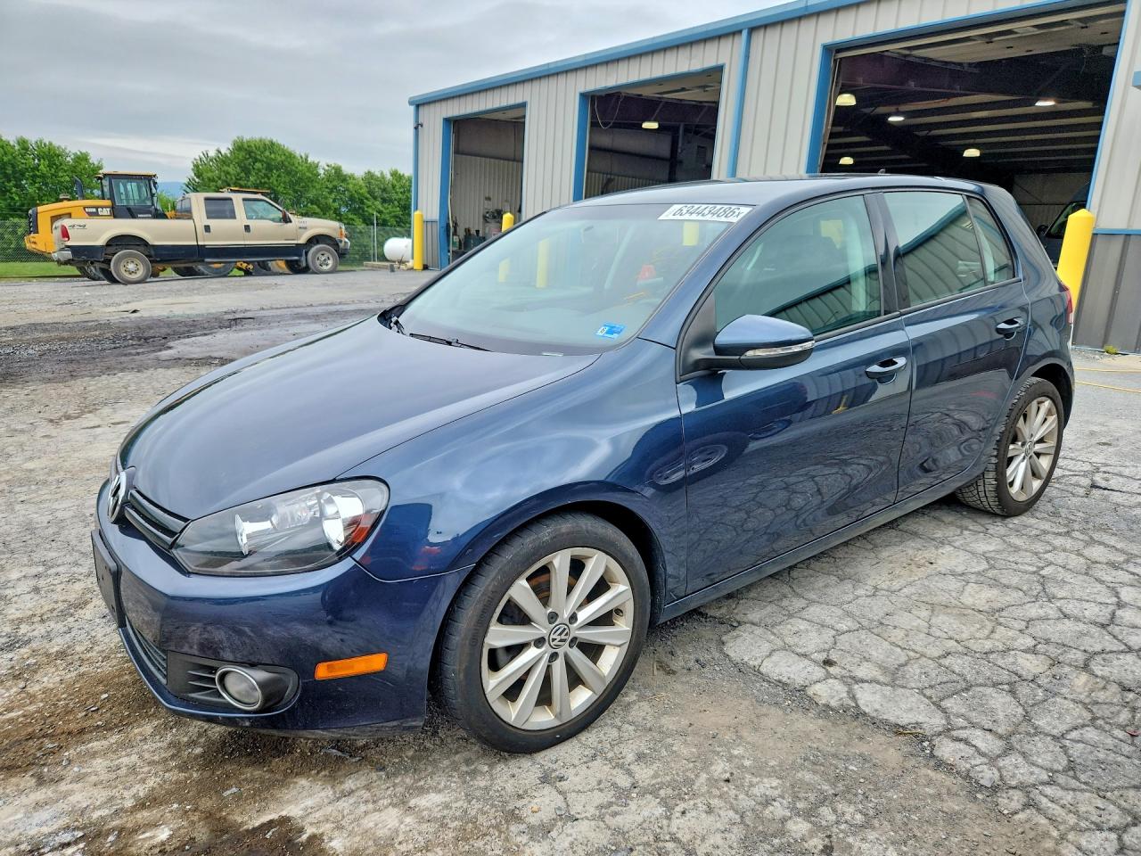 2013 Volkswagen Golf TDI w/Sunroof & Nav, VIN WVWNM7AJ6DW014384 — Зад