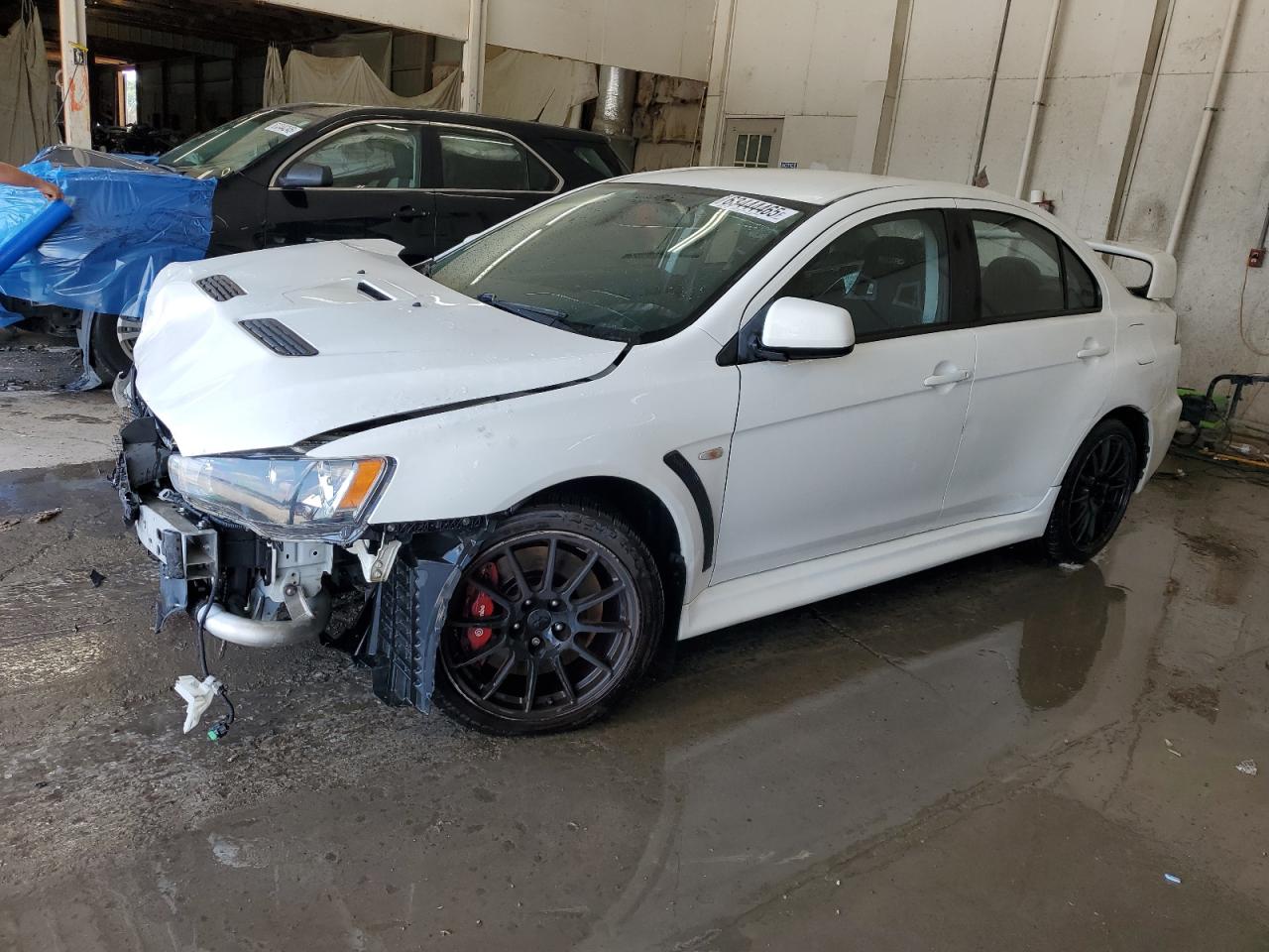 2014 Mitsubishi Lancer Evolution GSR, VIN JA32W8FV7EU024626 — Front end