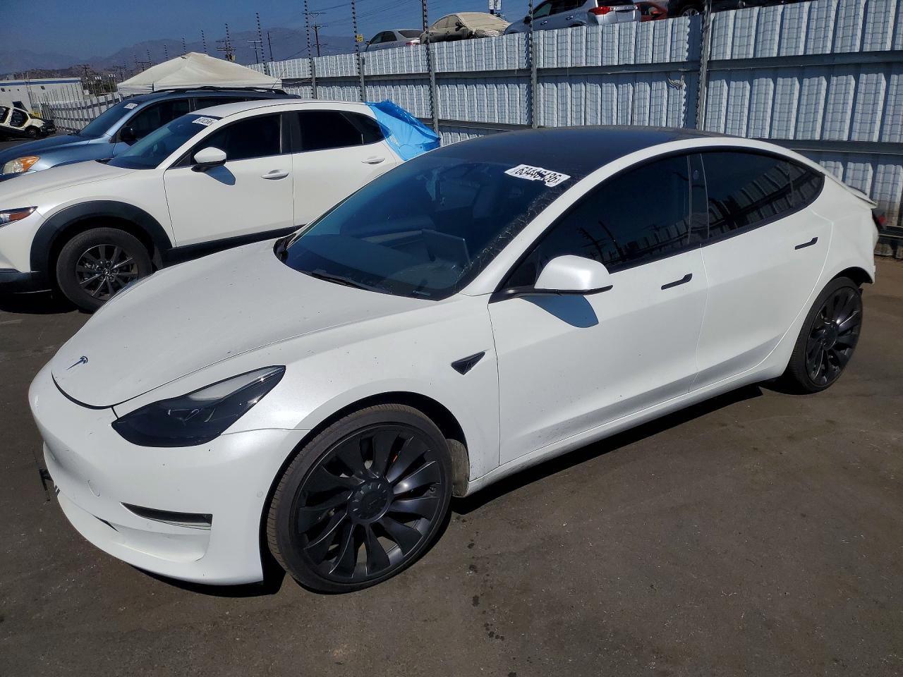 2022 Tesla Model 3 Performance, VIN 5YJ3E1EC1NF209313 — Rear end