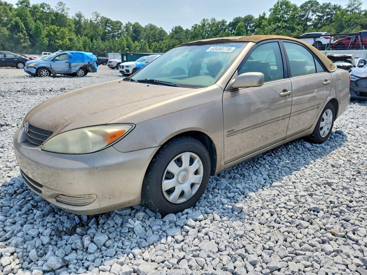 2002 Toyota Camry LE, VIN 4T1BE32KX2U050504 — Minor dents and scratches
