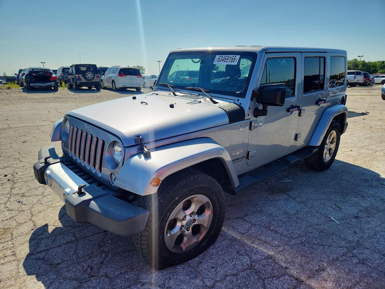 2015 Jeep Wrangler Unlimited Sahara, VIN 1C4HJWEG6FL622926 — Механическое