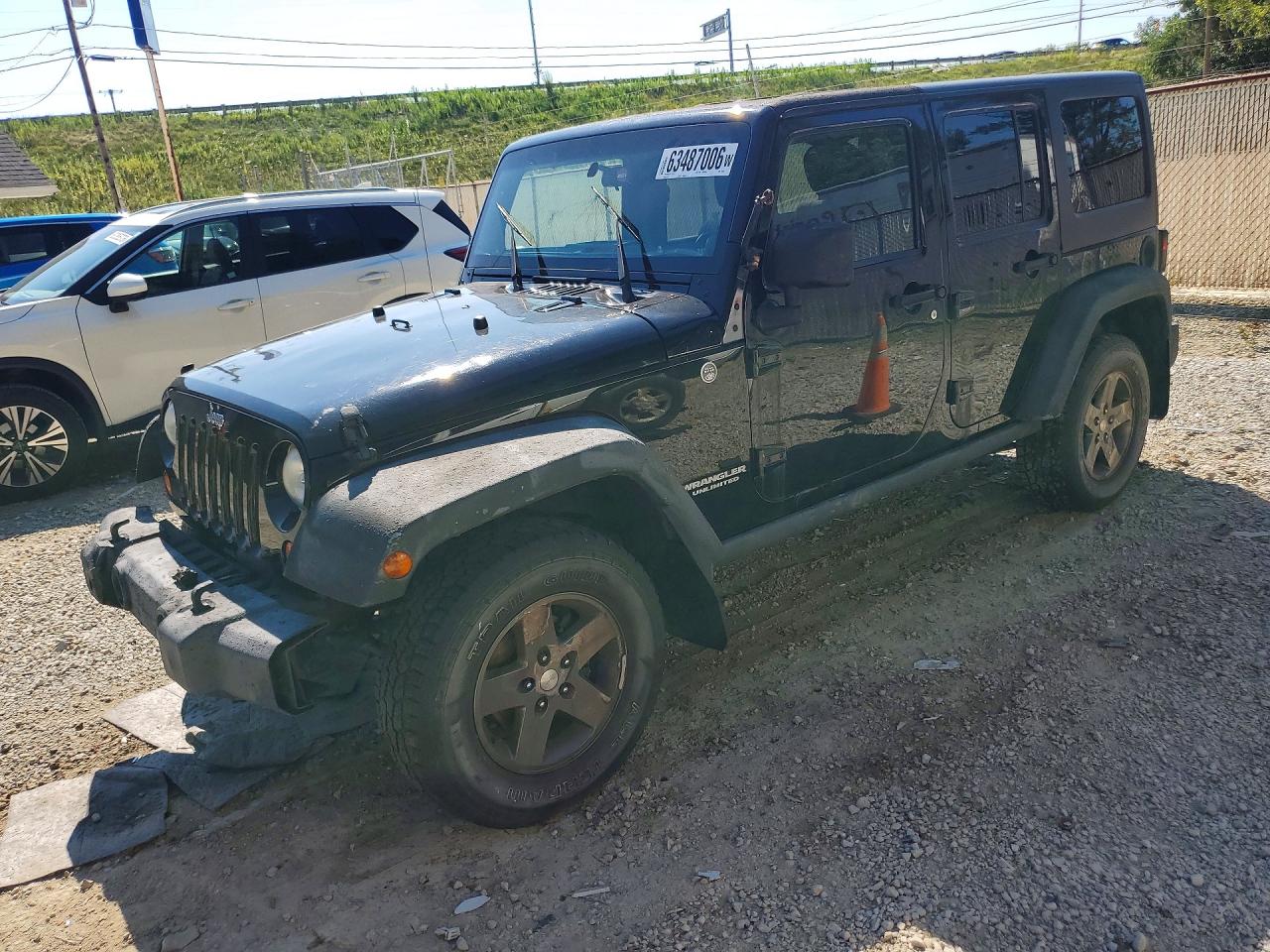 2012 Jeep Wrangler Unlimited Call of Duty MW3, VIN 1C4BJWFG5CL104693 — Normal wear
